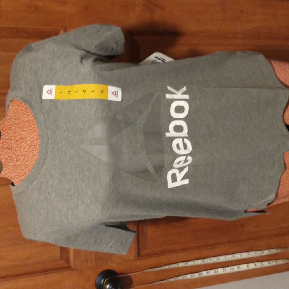 Reebok woman's size L short sleeve tagless tee shirt with multiple logos-NWT